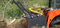 The skid steer Forestry Mulcher is a land clearing machine for breaking trails, leveling building sites, and clearing storm damage.